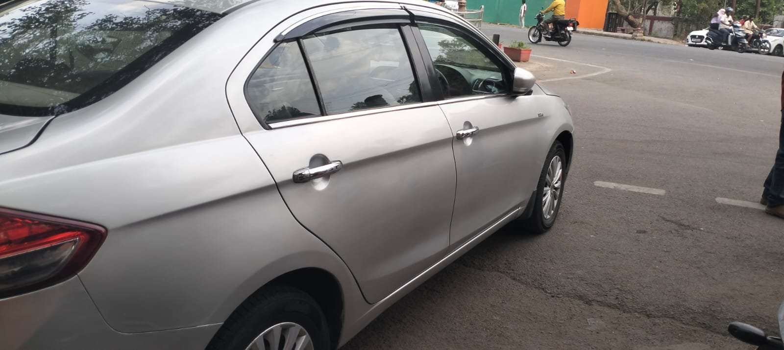 Clean silver sedan in Jhansi